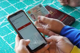 Hanoi is set to provide more public services via e-identification app VNeID. (Photo: VNA)