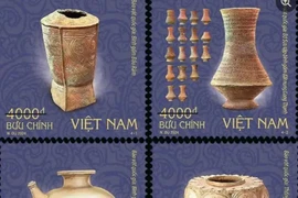 The new stamps feature the Dau Ram ceramic vase, the collection of Long Thanh terracotta vases, the Nhon Thanh ceramic vase, and the brown-flower ceramic jar. (Photo: Vietnam Post )