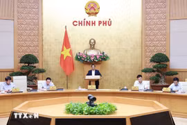 PM Pham Minh Chinh chairs the Government’s monthly meeting on August 5. (Photo: VNA)