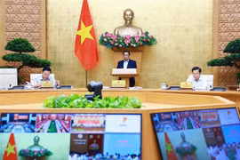 PM Pham Minh Chinh chairs the Government's regular meeting on July 6. (Photo: VNA) 