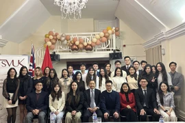 Participants in the 10th Congress of the Vietnamese Student Association in the UK pose for a group photo. (Photo: VNA)