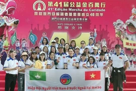 Representatives of the Vietnamese community in Macau join in the “Walk for a Million in Macau” charity event. (Source: VNA)