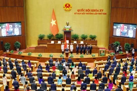Le Minh Tri takes an oath after being elected Chief Justice of the Supreme People’s Court on August 26. (Photo: VNA)