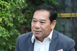 Vanxay Tavinyan, Vice Chairman of the LPRP Central Committee’s Commission for Propaganda and Training and Editor-in-chief of the Pasaxon newspaper, grants an interview to the Vietnam News Agency. (Photo: VNA)