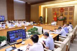 Participants in the conference chaired by Deputy PM Tran Hong Ha on May 21. (Photo: VNA)
