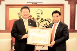 JICA Chief Representative honoured with insignia