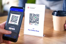 Mobile phone, QR code payments soar in popularity