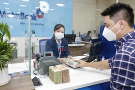 Reference exchange rate down 1 VND