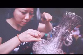 Photo exhibition depicts Hanoi craft villages 