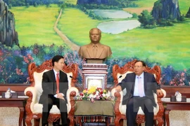 Lao leader lauds cooperation in popularisation work with Vietnam