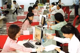 Reference exchange rate goes down 3 VND 