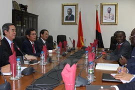 Party economic official visits Angola