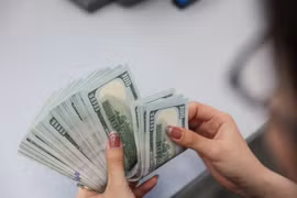 Reference exchange rate down 23 VND on July 11