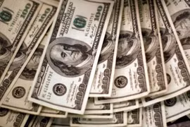 Reference exchange rate down 2 VND