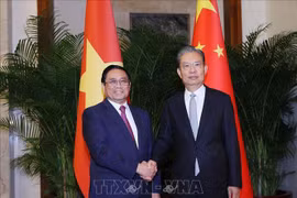 Prime Minister meets top Chinese legislator in Beijing