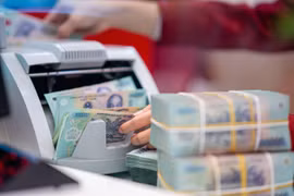 Dozens of commercial banks cut savings interest rates