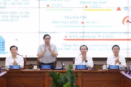 Permanent gov't members work with HCM City on socio-economic development