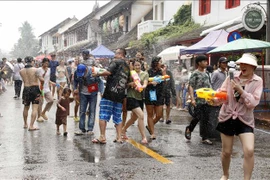Lao people ring in traditional New Year with a splash