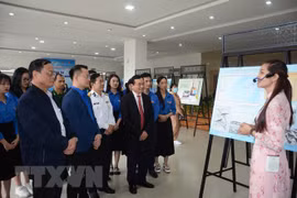 Photo exhibition highlights youths with seas, islands