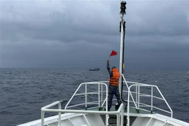 Fishing boat in distress towed to Song Tu Tay island