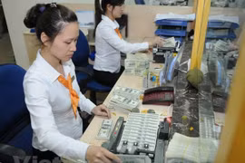 Reference exchange rate down 2 VND on March 17