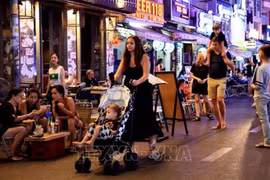 All-night hop-on hop-off bus tour launched in HCM City