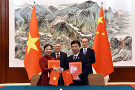 Border provinces’ courts tighten cooperation with Chinese counterparts