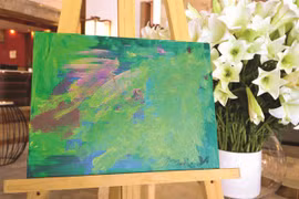 Fund-raising exhibition presents paintings by children with autism