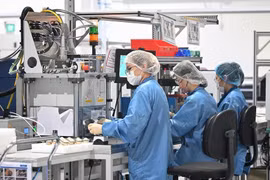 Singapore manufacturing activity inches up in February 