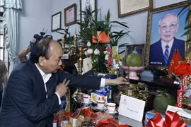 President pays pre-Tet visit to families of late Party, State leaders