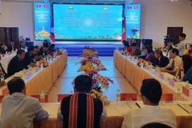 Vietnam, Laos boost front work cooperation among localities