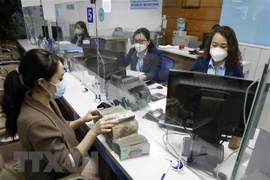 Reference exchange rate up 23 VND