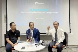 A Marvell representative introduces the firm's products (Photo: VNA)