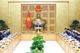 Prime Minister Pham Minh Chinh speaks at the seminar. (Photo: VNA)