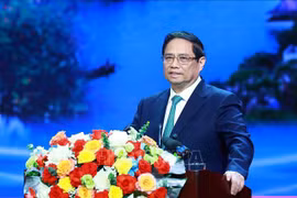 Prime Minister Pham Minh Chinh speaks at the event. (Photo: VNA)