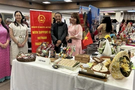 The Vietnamese booth at the charity fair. (Photo: VNA)
