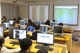 Mining, auto stocks lift markets