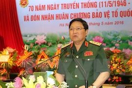 Defence minister pays official visit to Laos, attends ADMM-10