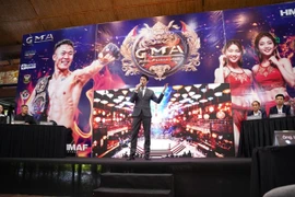 General Director Johnny Trí Nguyễn introduces his Gods of Martial Arts fighting contest which will begin on August 24 in HCM City. (Photo of GMA) 