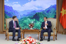 Prime Minister Pham Minh Chinh receives Nick Clegg, President of Global Affairs at Meta, in Hanoi on September 30. (Photo: VNA)