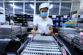 A Japan-invested enterprise in Hoa Binh province. Foreign investors registered to invest more than 18 billion USD in Vietnam as of July 20, a rise of 10.9% over the same period last year. (Photo: VNA) 