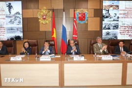 Delegates at the symposium to mark the 30th anniversary of the signing of the Treaty on Principles of Friendly Relations between Vietnam and Russia, and the 70th anniversary of Vietnam's Dien Bien Phu Victory (May 7, 1954). (Photo: VNA)