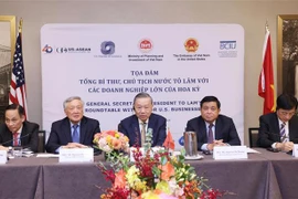 Party General Secretary and State President To Lam (C) attends forum with leading US businesses. (Photo: VNA)