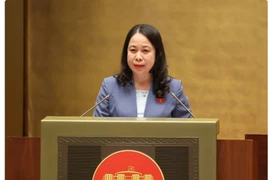 Vice President Vo Thi Anh Xuan presents a proposal on the ratification of a document on the UK’s CPTPP membership to the National Assembly at its ongoing session on June 8, 2024. (Photo: VietnamPlus)