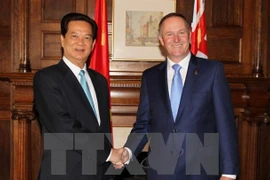Vietnamese Prime Minister Nguyen Tan Dung (L) and his New Zealand counterpart John Key (Photo: VNA)