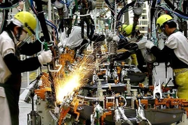 Workers at a Toyota factory in Thailand (Photo: AFP)