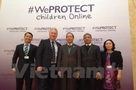 The delegation, led by Deputy Minister Le Quy Vuong (centre), attends the summit in London on Dec.10-11 