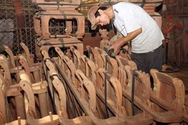 Wooden products are prepared for export at Son Dong company in Ha Noi's Thuong Tin district. Local firms will face increased competition in the AEC market.(Photo: VNA/VNS)