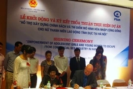 At the signing ceremony. Photo: VNA