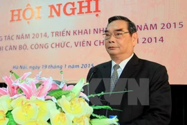 Politburo member and standing member of the Secretariat of the Party Central Committee Le Hong Anh attended the event. (Photo: VNA)